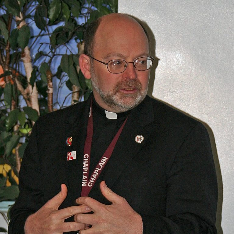 Father Chris Ponnet